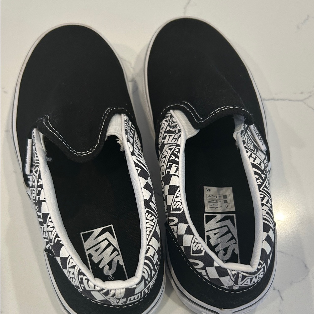 Vans Kids Black and White Slip-On Sneakers